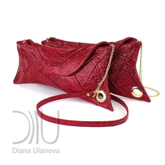 red designer clutch bag