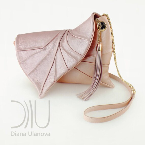 beige clutch bag designer