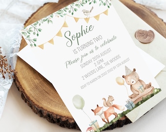 May include: A woodland-themed birthday invitation for Sophie's second birthday party. The invitation features a watercolor illustration of a fox, squirrel, and bear with balloons and presents. The text reads "Sophie is turning two. Please join us to celebrate. Sunday 20th August 2-5pm. 2 Woods Lane, The Woods. RSVP to Karen on 2002 2002 by 13th August."