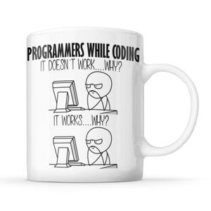 May include: A white ceramic mug featuring black text and line art. The text reads: PROGRAMMERS WHILE CODING. Below, two panels show a stick figure at a computer with the captions: IT DOESN'T WORK....WHY? and IT WORKS....WHY? The mug has a side handle.