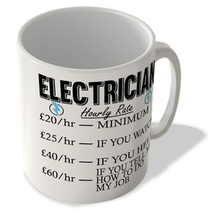 May include: White ceramic mug with the word "ELECTRICIAN" in bold black letters. The mug features a humorous hourly rate chart, with prices ranging from £20/hr to £60/hr, and a lightning bolt graphic. The mug has a curved handle.