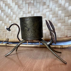Vintage brass dog match holder etched