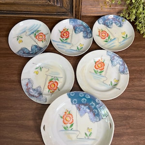 vintage made in Japan, lusterware saucers, and tray