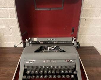 Vintage Royal Deluxe AG portable manual typewriter with carrying case and manual Ernest Hemingway typewriter of choice