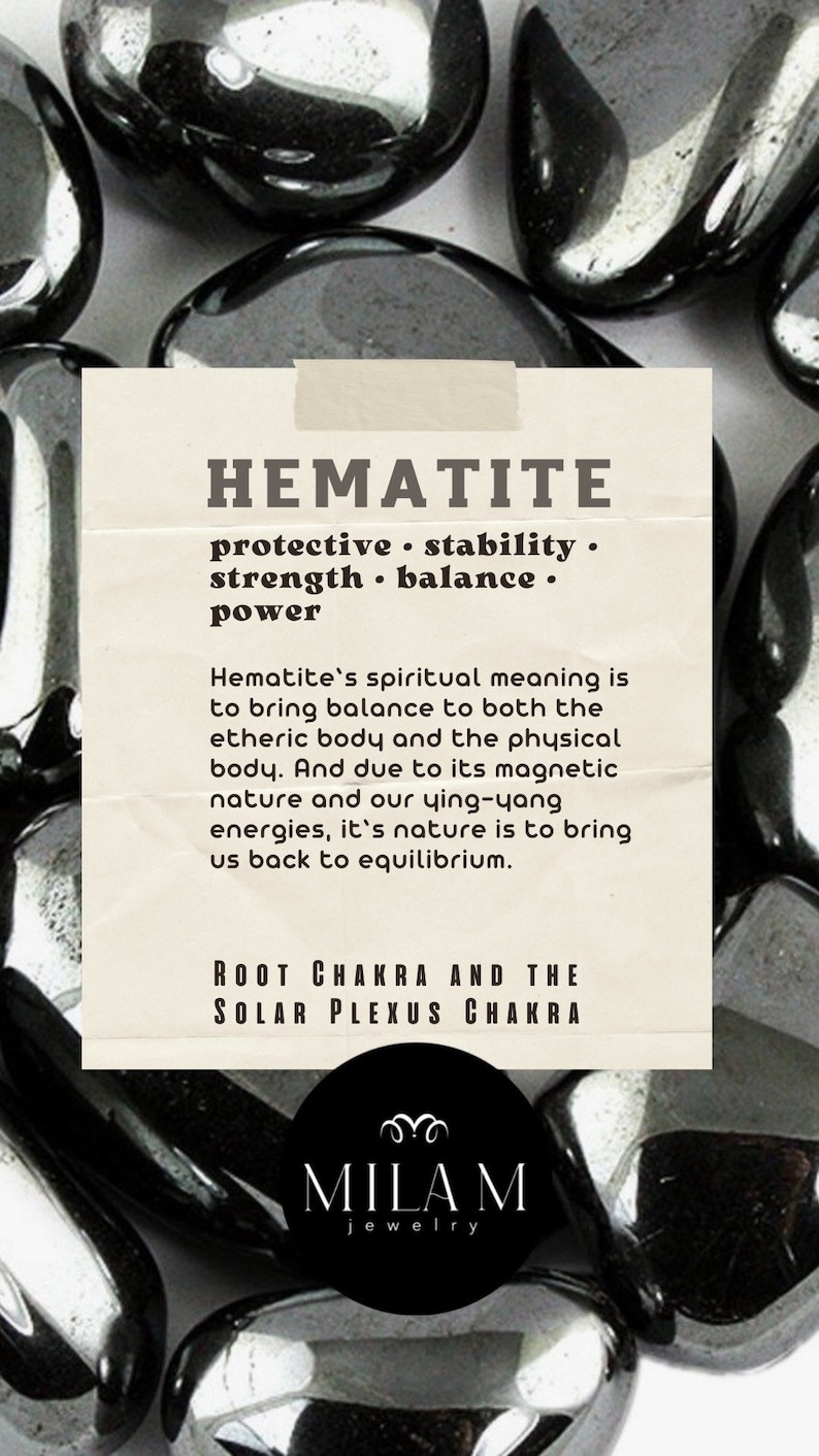 May include: Close-up of several smooth, black hematite stones. The stones are arranged in a pile and have a metallic sheen. The text "HEMATITE" is written in white on a beige background, along with information about the stone's properties and chakra associations. The text "MILAM jewelry" is written in white on a black circle.