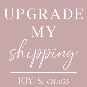 May include: A blush-colored background with white text that reads "UPGRADE MY shipping". Below the text is a white horizontal line, and the words "JOY & CHAOS" are written below the line in a smaller font.