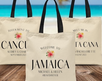 May include: Three canvas tote bags with tropical flower designs and text. The bags are beige with black handles. The text on the bags reads "Totes Went To Canci Audrey & Char September 2023", "Welcome To Jamaica Michael & Helen #BestDayEver", and "Meet Me In Ta Cana Bachelorette August 2023".