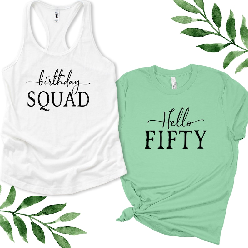 May include: Two shirts, one white tank top with the text "birthday SQUAD" and one green t-shirt with the text "Hello FIFTY".