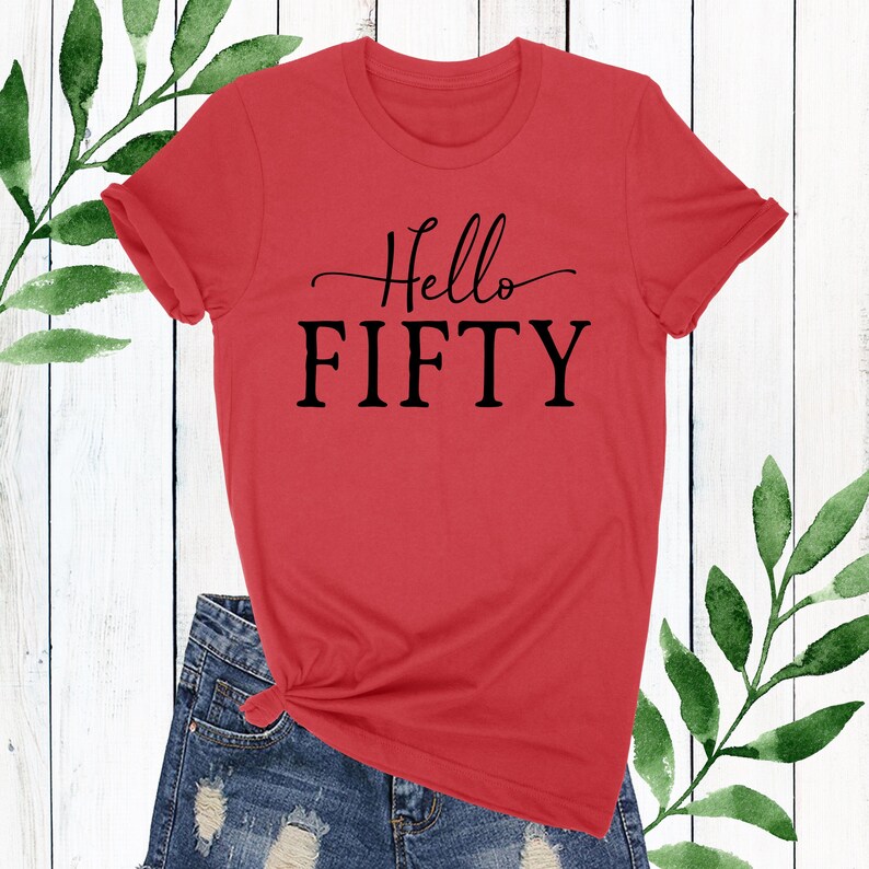May include: Red t-shirt with black text that says "Hello Fifty".