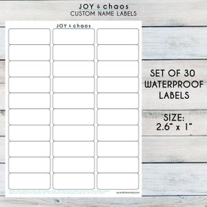 May include: Set of 30 waterproof labels, each measuring 2.6 inches by 1 inch. The labels are white with a black border and are ready to be personalized.  JOY & chaos CUSTOM NAME LABELS.