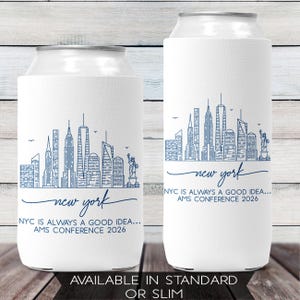 May include: White can coolers with a blue line drawing of the New York City skyline. The words "new york" are written in cursive, with the text "NYC IS ALWAYS A GOOD IDEA... AMS CONFERENCE 2026" below. Available in standard or slim.