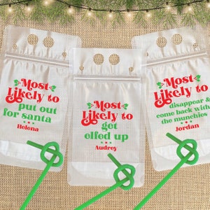 May include: Three clear plastic bags with red and green text that reads "Most Likely to" followed by a different phrase on each bag. The phrases are "put out for santa", "get elfed up", and "disappear & come back with the munchies". Each bag has a green straw and a name written below the phrase.