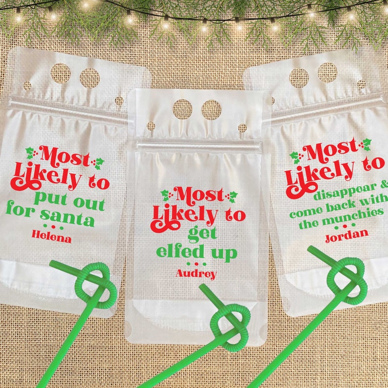 May include: Three clear plastic bags with red and green text that reads "Most Likely to" followed by a different phrase on each bag. The phrases are "put out for santa", "get elfed up", and "disappear & come back with the munchies". Each bag has a green straw and a name written below the phrase.