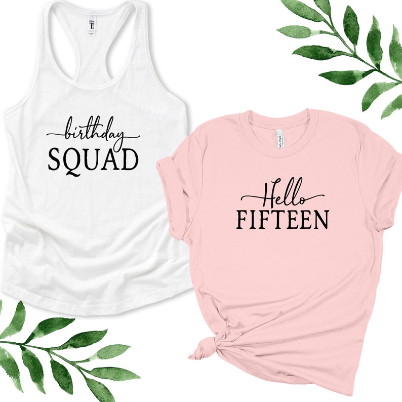 May include: Two shirts, one white tank top with the text "birthday SQUAD" and one pink t-shirt with the text "Hello FIFTEEN".