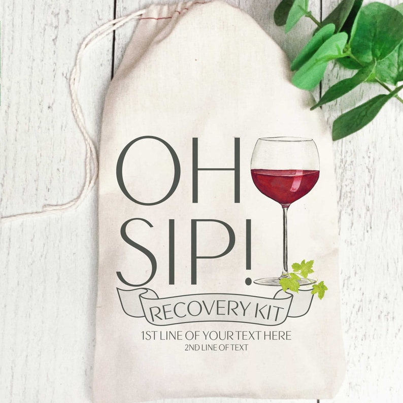 May include: White cotton drawstring bag with the text "OH SIP! RECOVERY KIT" and a glass of red wine. The text "1ST LINE OF YOUR TEXT HERE" and "2ND LINE OF TEXT" is also printed on the bag.