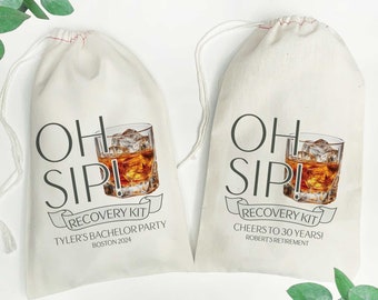 May include: Two white cotton drawstring bags with the text "Oh Sip! Recovery Kit" printed on them. One bag says "Tyler's Bachelor Party Boston 2024" and the other says "Cheers to 30 Years! Robert's Retirement". Both bags feature a graphic of a glass of whiskey with ice.