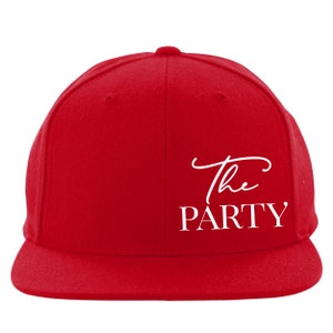 May include: Red baseball cap with a white embroidered design that says "The PARTY".