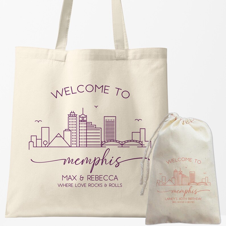May include: Cream-colored tote bag and drawstring bag featuring a purple Memphis skyline design. The tote bag reads "WELCOME TO Memphis" with the names "MAX & REBECCA" and the phrase "WHERE LOVE ROCKS & ROLLS". The drawstring bag has the text "LANEY'S 40TH BIRTHDAY".