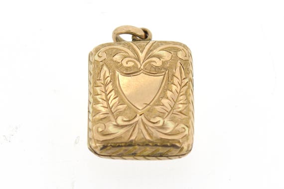 A vintage, rectangular shaped locket. - image 1