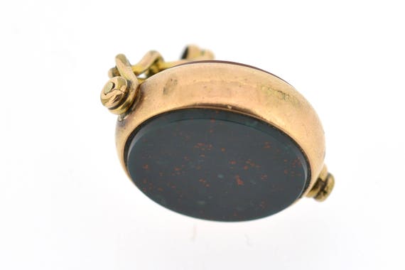 An antique, round shaped 9ct gold swivel fob with… - image 5