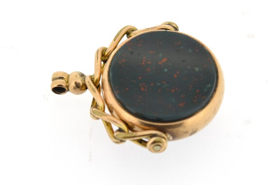 An antique, round shaped 9ct gold swivel fob with… - image 2