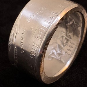 Handmade ring from a 2005 Marine Corps 230th anniversary coin. Size 11 is pictured but all rings will be made to order