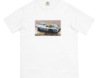 May include: White t-shirt with a vintage photo of a blue and white race car with the number 15 on the side.