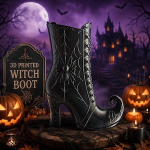 May include: A black 3D printed witch boot featuring a raised spider web pattern with a central spider, a lace-up front design, and a curved toe. The boot is displayed next to a sign that reads 3D PRINTED WITCH BOOT in gold lettering.