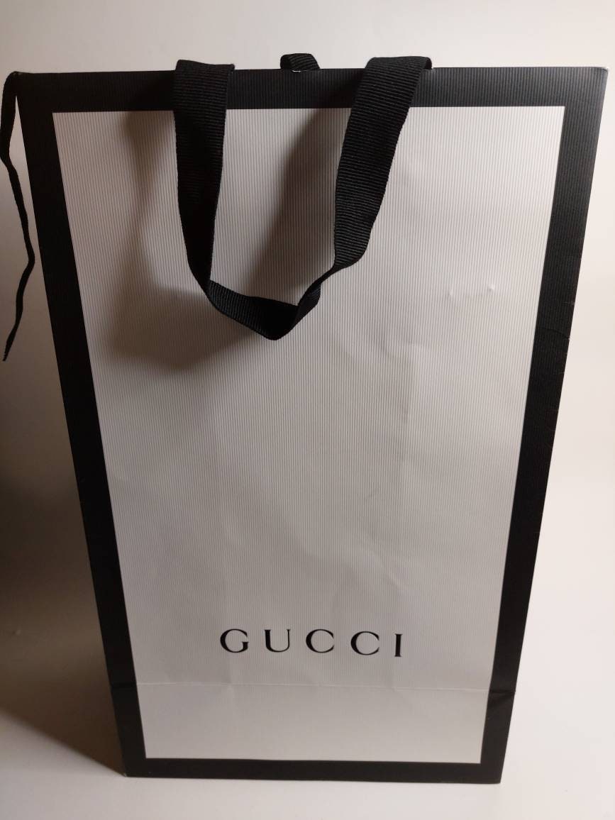 2 Bags of GUCCI Paper 