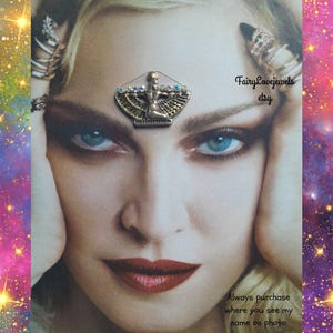 May include: A woman's face with a gold-toned headpiece adorned with blue and clear crystals. The image includes the text "FairyLoveJewels etsy" and "Always purchase where you see my name on photo."