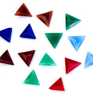 May include: A selection of multi-coloured, triangular gemstones in shades of red, blue, green, and brown. The gemstones are displayed on a white background, highlighting their faceted surfaces and vibrant hues. These decorative gems are suitable for jewellery making or craft projects.