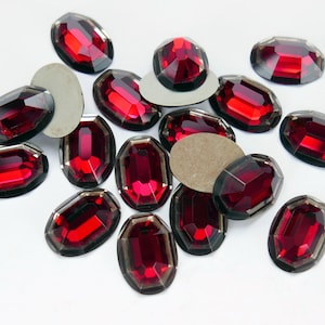 May include: A set of three ceramic nesting bowls in shades of blue, green, and white. The bowls feature a speckled glaze and a simple, modern design. The largest bowl measures approximately 8 inches in diameter.