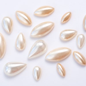 12 vintage navette- of peervormige cabochons van Tsjechisch parelglas - 7 maten - 2 vormen - J27