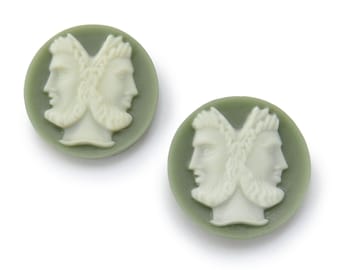 May include: Two-sided cameo buttons with a green background and white raised profile of two faces facing opposite directions.