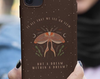 May include: A brown phone case with a galaxy print and a moth illustration. The text on the case reads "Is all that we see or seem, but a dream within a dream?"