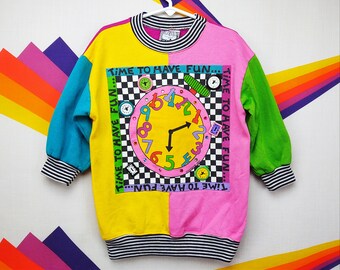 pink purple blue yellow sweater