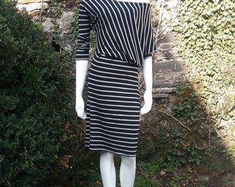 New, asymmetrical, elegant and sporty woman viscose dress. Casual, party or everyday dress