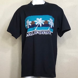 Vintage anos 80 / Camiseta azul marinho e branca / Palmeira da Califórnia / Estampa gráfica / Ponto único / Manga curta / Camiseta unissex / Estilo de vida praiano
