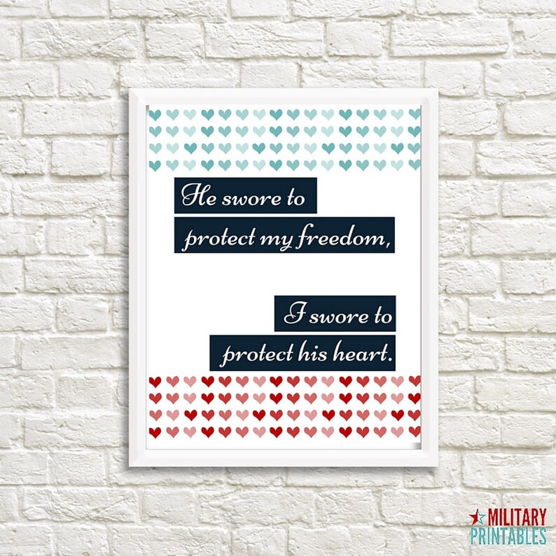 May include: A printable wall art design with a white background and navy blue text. The text reads "He swore to protect my freedom, I swore to protect his heart." The top and bottom of the design are decorated with rows of blue and red hearts.