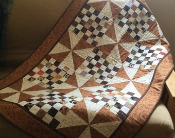 Scrappy patchwork and pinwheel quilt
