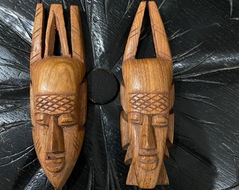 Two vintage wooden masks from the Côte d’Ivoire