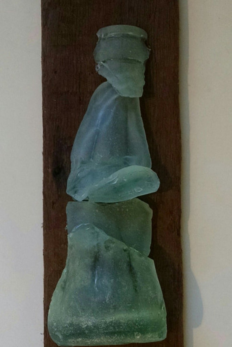 Sea Glass Coke Bottle On Driftwood