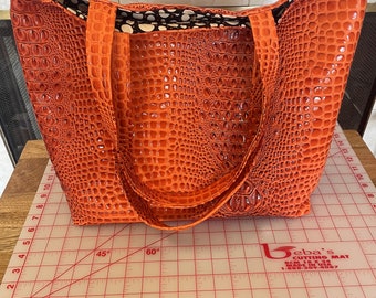 Gorgeous Designer Faux 3D Embossed Gator Leather Travel Tote Bag. Orange Crush Color. Magnetic Snap Closure. Eight Pockets. One of a Kind.