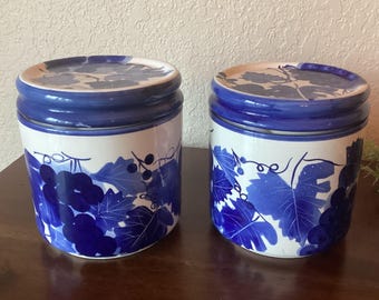 Pair of handpainted ceramic canisters with lids, blue grapes and leaves, Designpac Inc, vintage