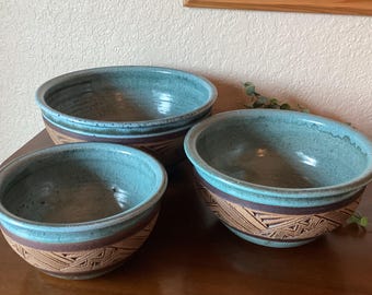 Nesting stoneware bowls by Blaisdell Pottery, Colorado, sold individually, blue glaze with brown design, vintage