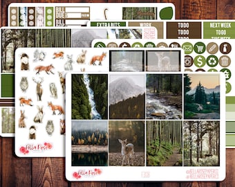 May include: A set of planner stickers featuring a woodland theme. The stickers include a variety of forest animals, trees, and landscapes. The stickers are printed on white paper with a glossy finish.