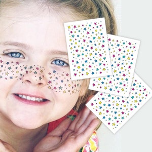 Stern Sommersprossen Flecken Tattoo-Transfers. Set mit 3 Bögen Gesichts-Körper-Aufklebern. Star Tattoo Beauty Marks, Kinder-Party-Make-up-Look.