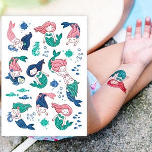 tatuaggio del piede in scala di sirena