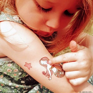 Girl Wearing Mermaid Party Temporary Tattoo Transfers For Kids. Under The Sea Themed Body Stickers. Birthday Party Favors.