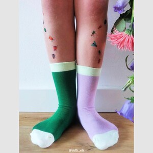 Kid wearing bugs temporary tattoo transfers. Set of 36 tiny beetles body stickers for kids.